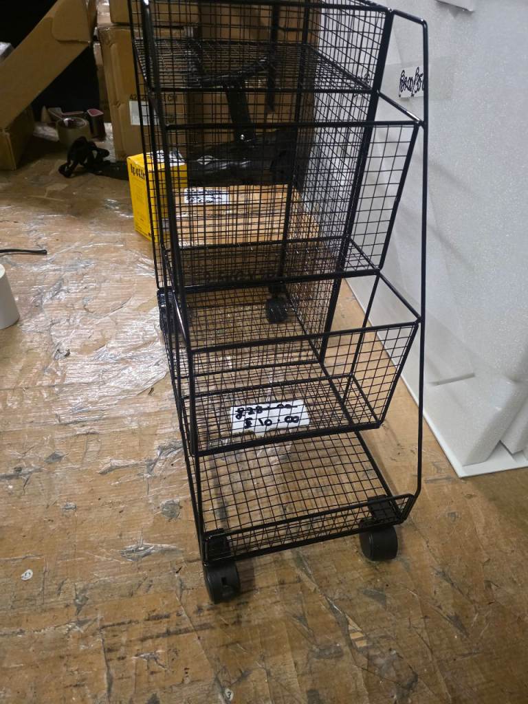A new black metal x mesh storage trolly.