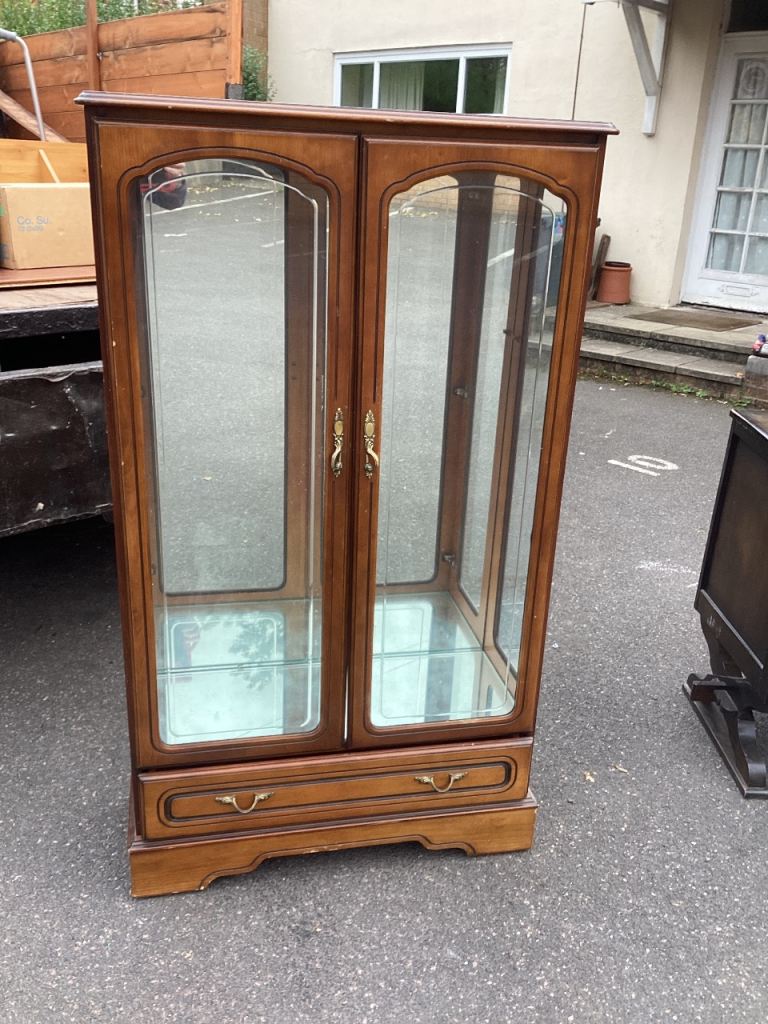 Wooden Display Cabinet with Glass Doors and Drawer – Good Condition