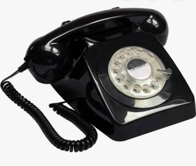 Corded 70s black telephone branc new