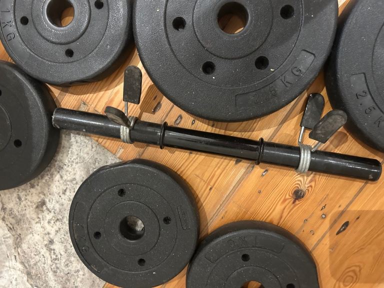 Dumbbell with weight plates