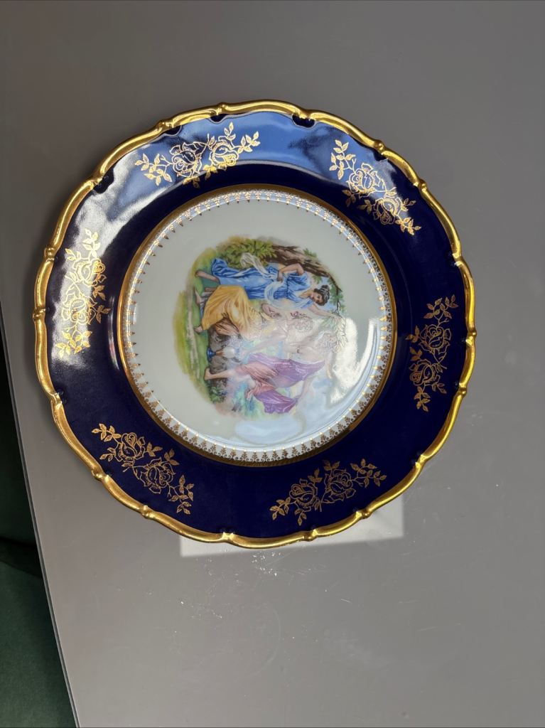 Collection of decorative plates and vases 