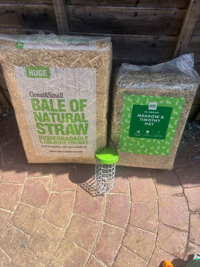 Unopened straw and hay and food caddy