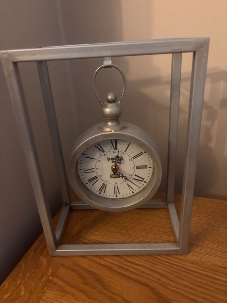 Grey hanging clock 