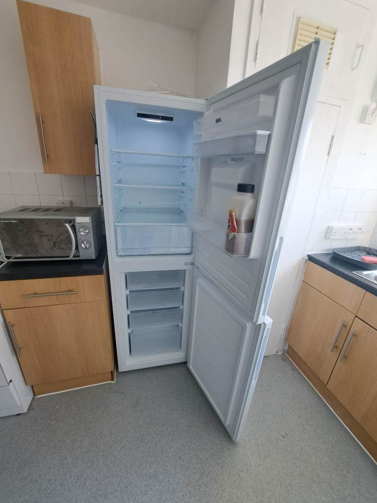 SIA Fridge Freezer with Water Dispenser – Good Condition