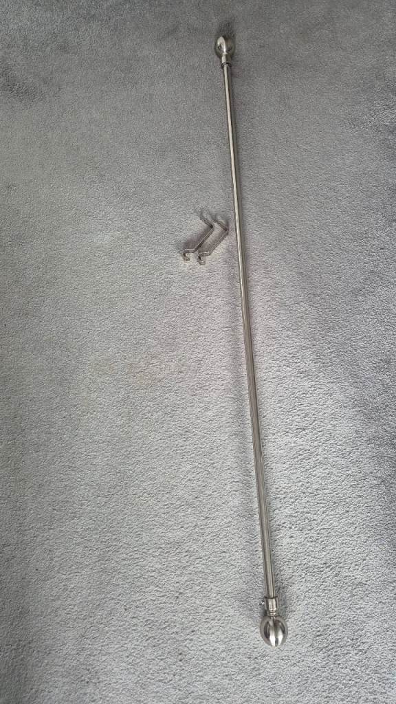 Silver adjustable curtain pole brand new 