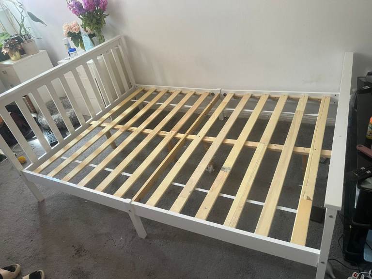 White bed frame and matress