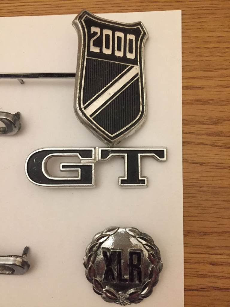 Original Ford Capri MkI 2000 GT XLR metal badges (laurel leaf and others), letters and trim