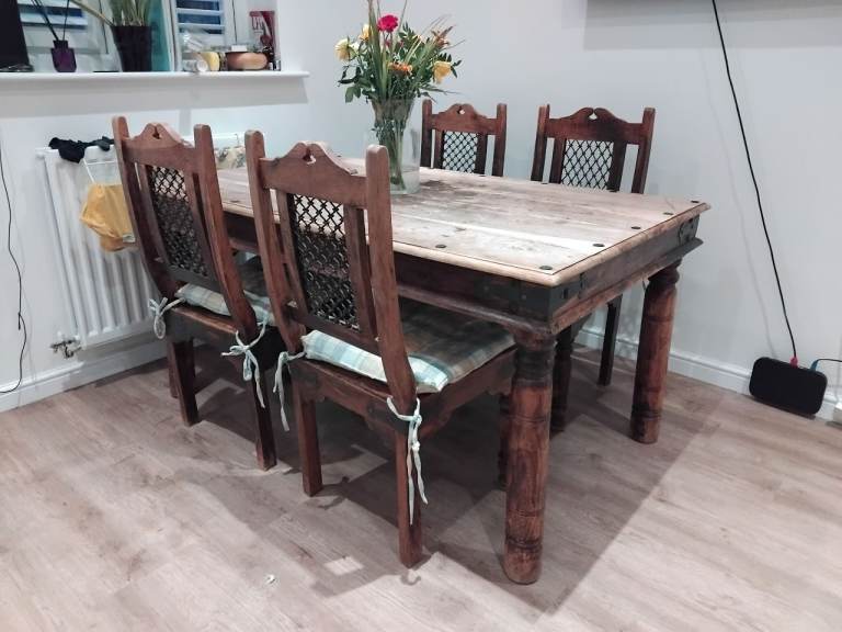 SOLID OAK DINING TABLE AND FOUR CHAIRS - VERY HEAVY SET OF FURNITURE