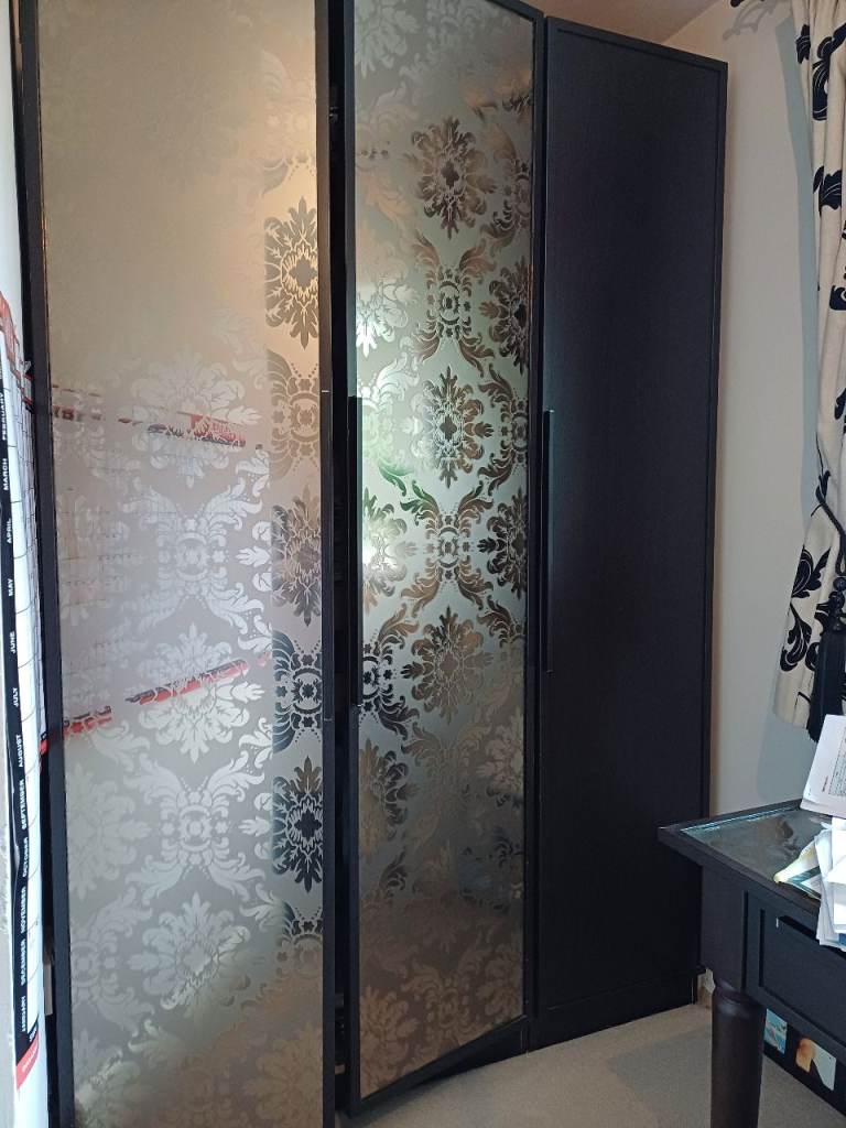 Black/glass wardrobe.  