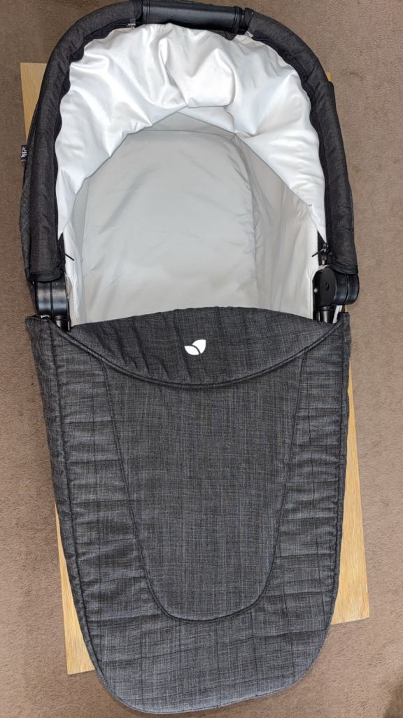 Joie Chrome DLX carry cot with rain cover & adapters