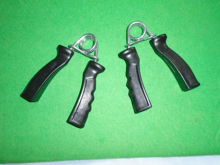 Spring Grip Hand Exerciser New . Dont let these get away from you.