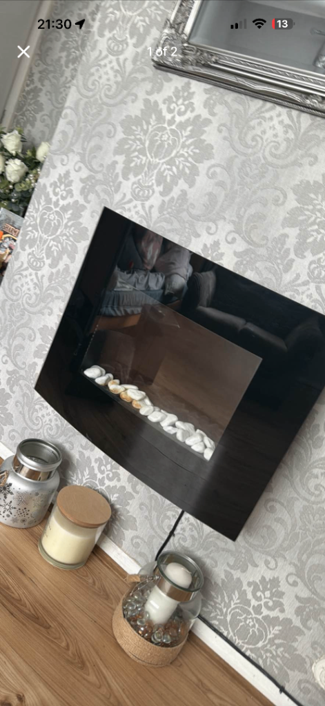 Modern Black Electric Fireplace with White Pebbles