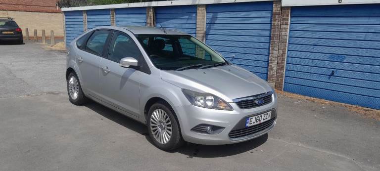 Ford Focus Titanium 1.6l petrol manual 2011. 5dr in silver. 74K miles. 12 month MOT Aug'27 FSH