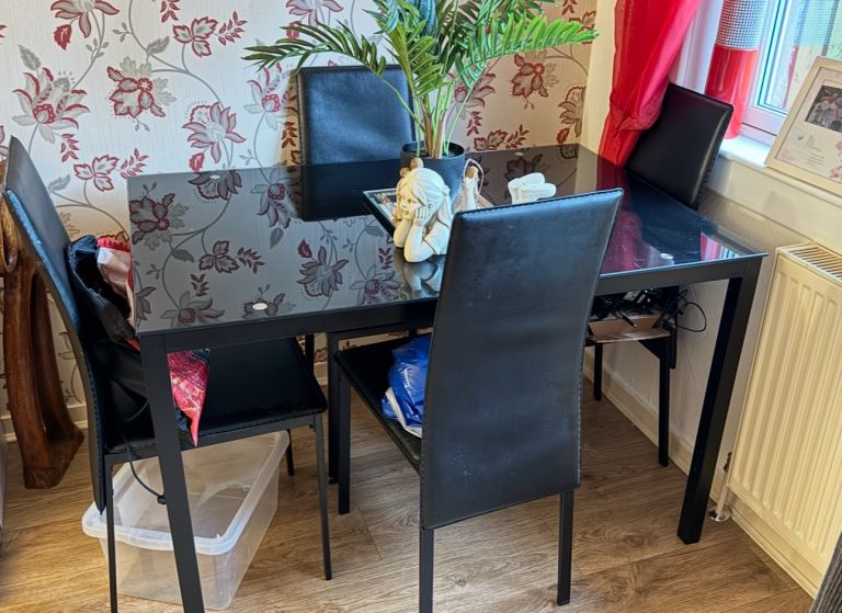 *FREE*. Black dining table & chairs 