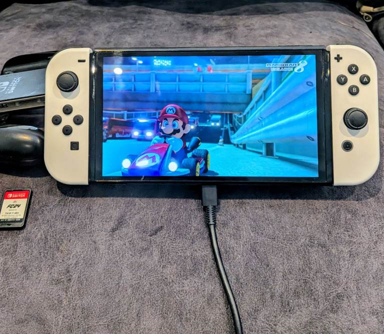 Nintendo Switch OLED + Dock with Mario Kart 8, FC 24 & Jumanji