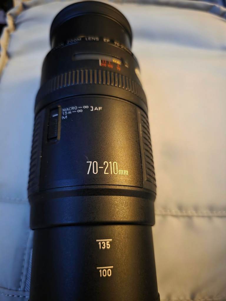 2 canon cameras with loads of accessories.