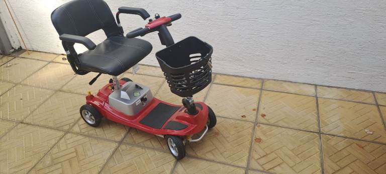 Red Mobility Scooter with with lithium battery  – Lovely Condition