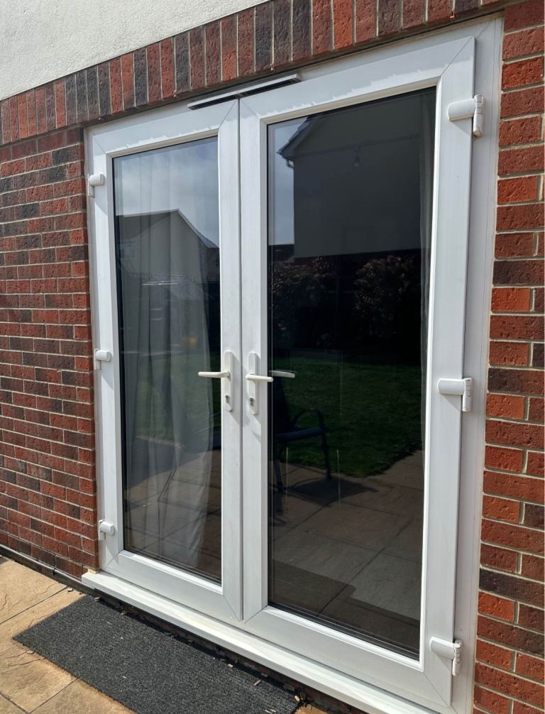 Large white UPVC French doors