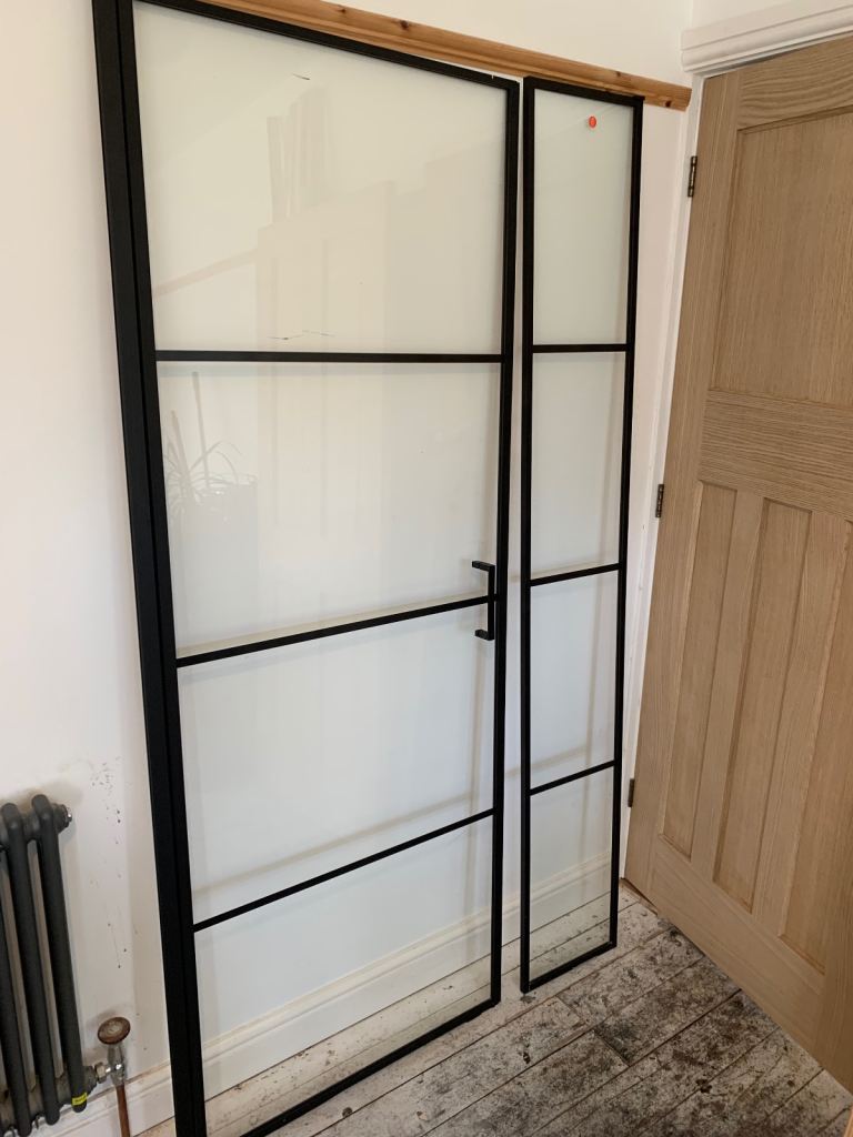 Glass shower door and panel (unboxed but unused)