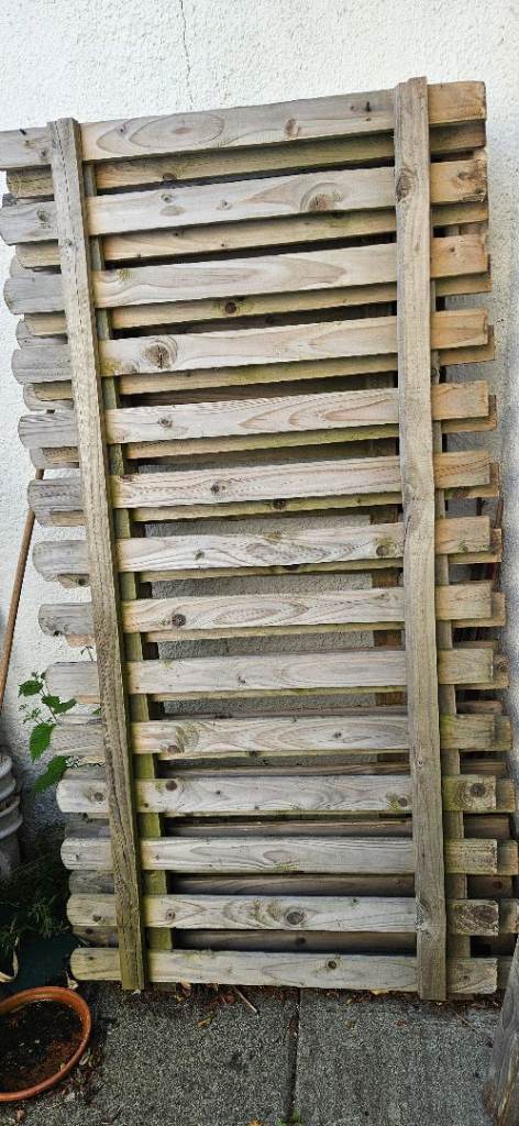 Wooden picket fence panels