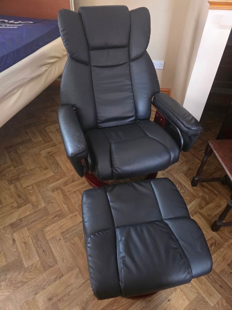 Comfortable Black Leather Recliner Armchair with Footstool