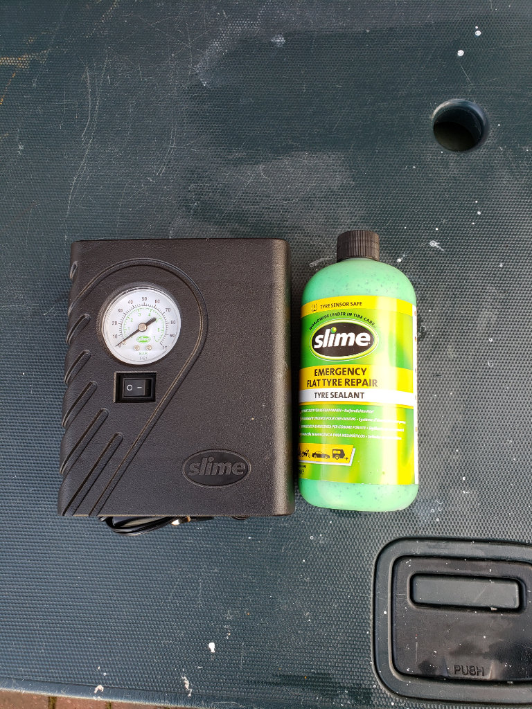 Slim tyre inflator with repair kit