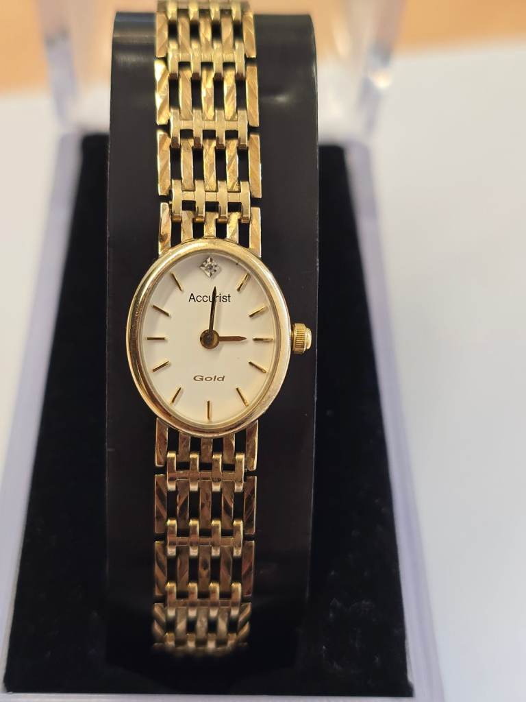 9CT GOLD ACCURIST QUARTZ WATCH WITH GATE STYLE BRACELET