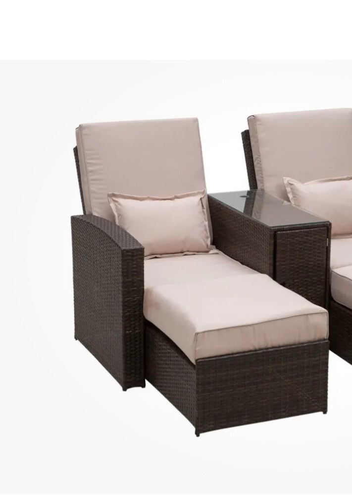 Rattan double chairs/sunbeds.  