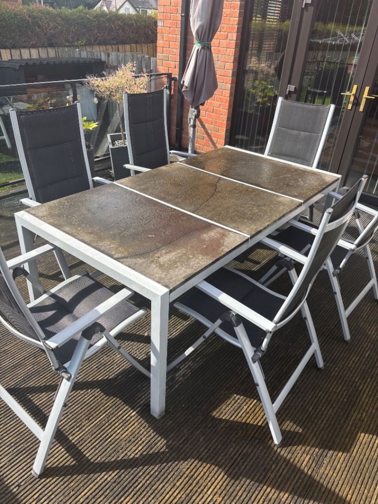 Outdoor Dining Table with 6 matching chairs – Large, Stone-Effect Top, Aluminium Frame