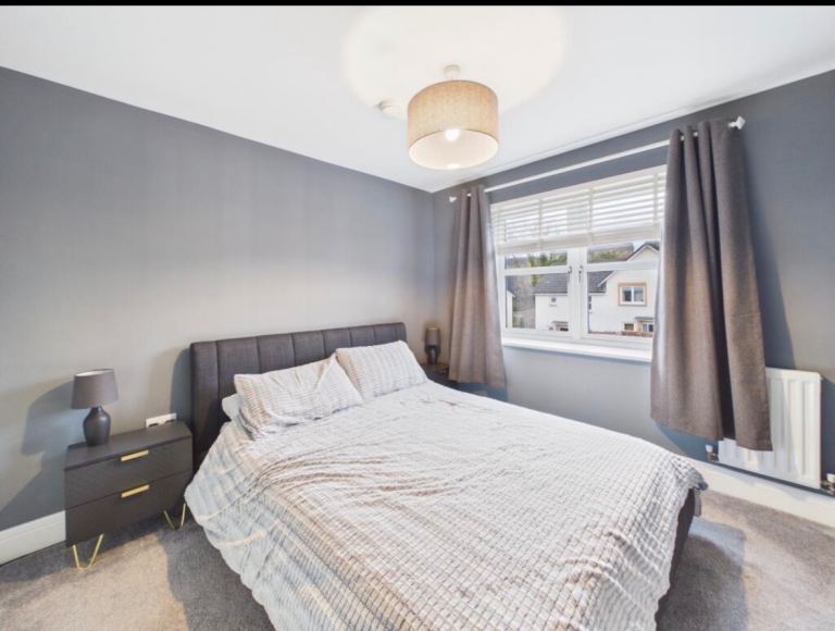 Grey king sized bed