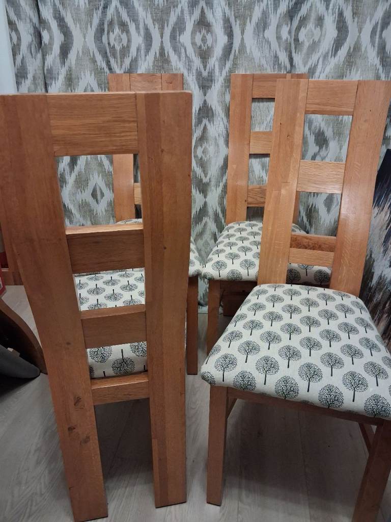 Set of 4 solid oak dining chairs plus Buxton oak dining table wuth extension panel 