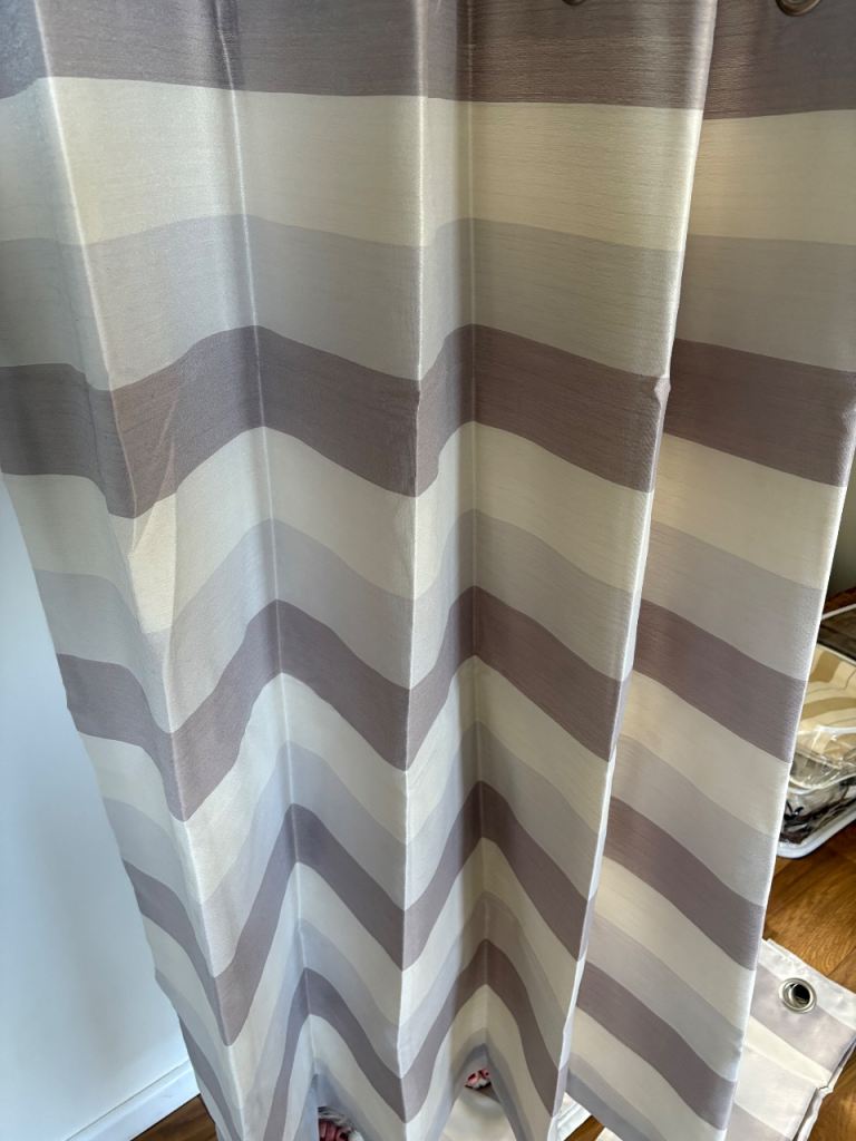 Two pairs of eyelet curtains 