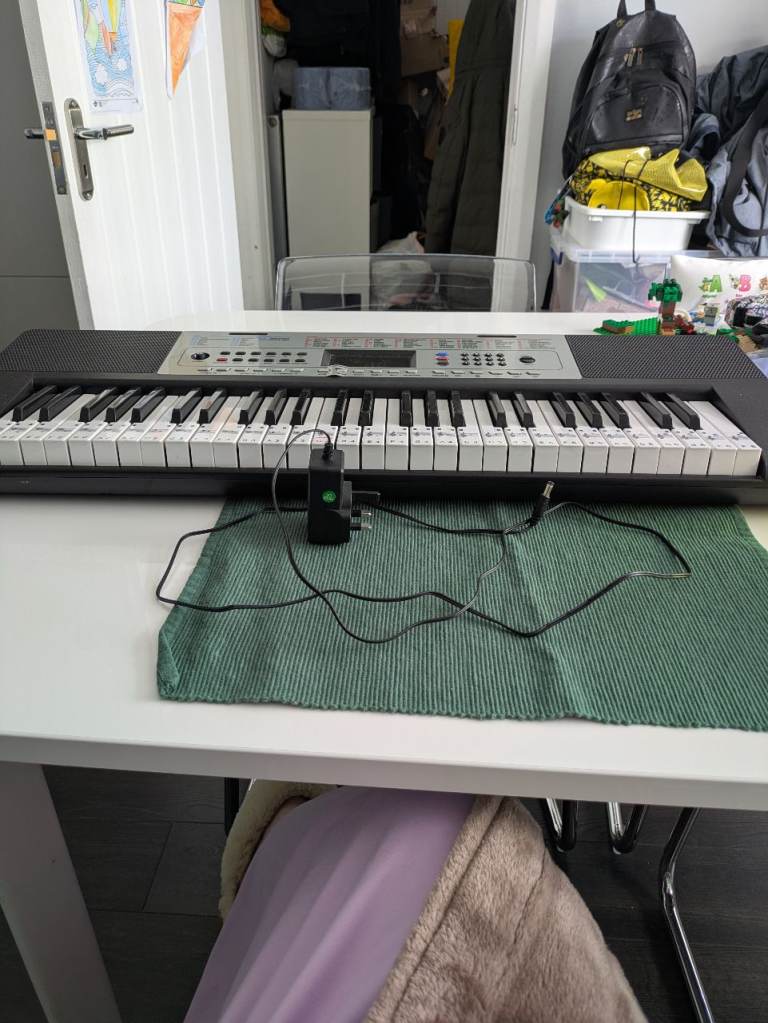 Electronic Keyboard Piano with Power Supply – Good Condition
