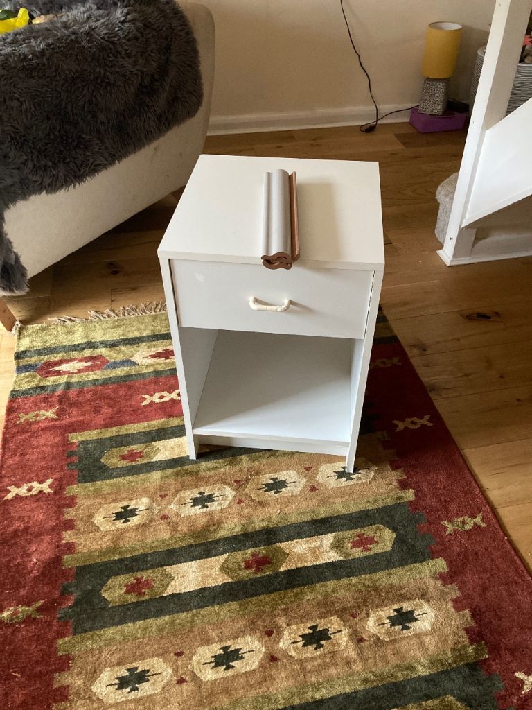 White bedside table