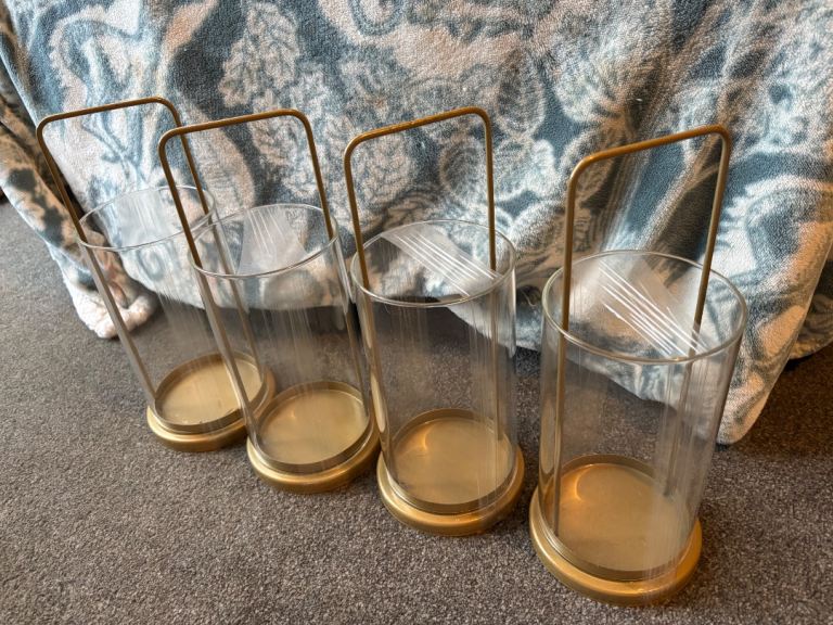 4 gold hurricane candle holders