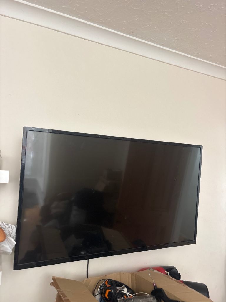 Large Black Flat Screen TV – Good Condition