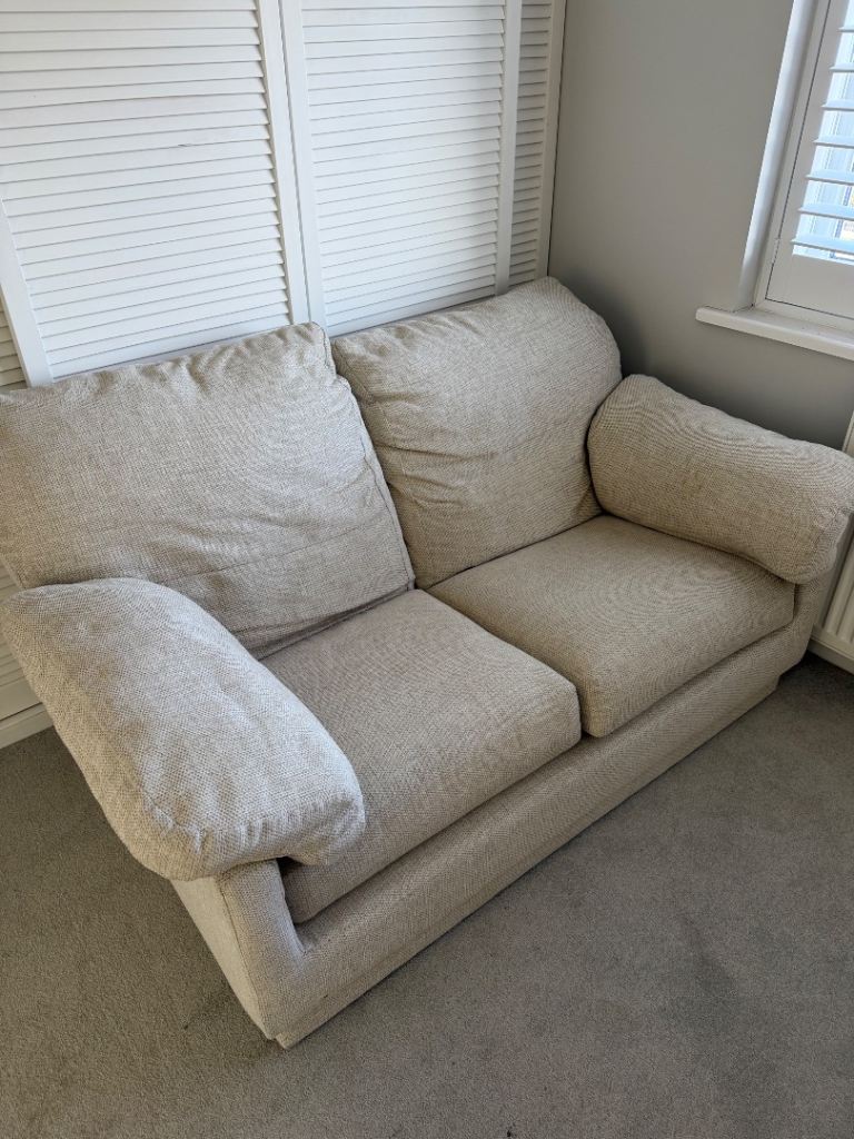 Comfortable Beige Two-Seater Sofa – Good Condition