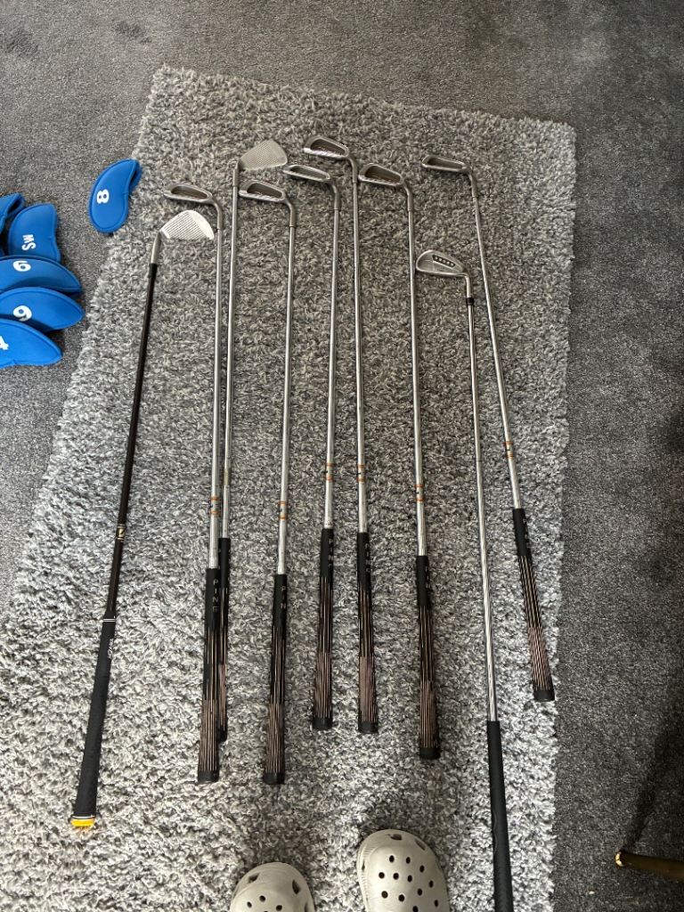 Golf clubs and electric buggy 