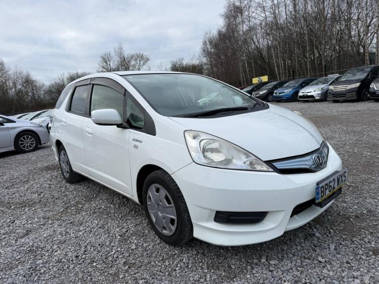 2012 Honda Fit  1 330 CC HONDA FIT SHUTTLE HB Hybrid