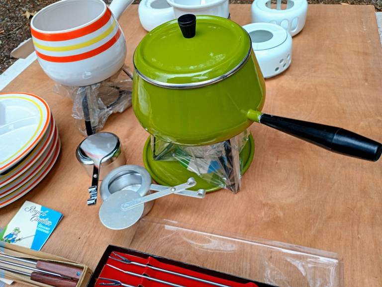2 vintage unused fondue sets with forks, 4 plates and some extras. 