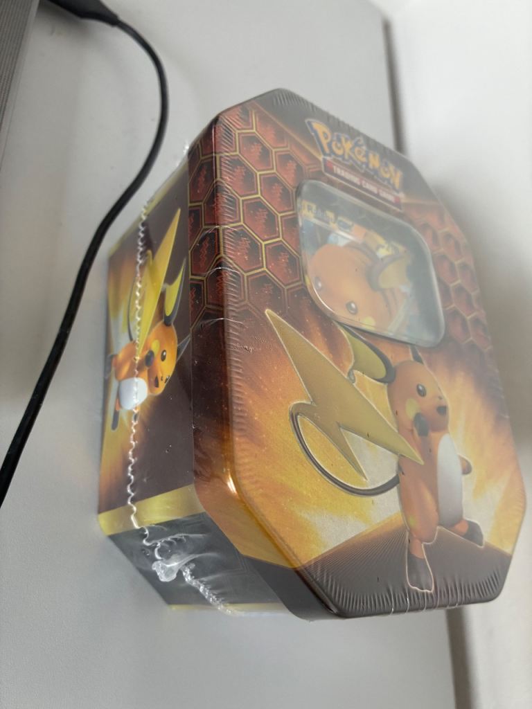 Pokemon Trading Card Game Tin - Raichu GX - New, Sealed