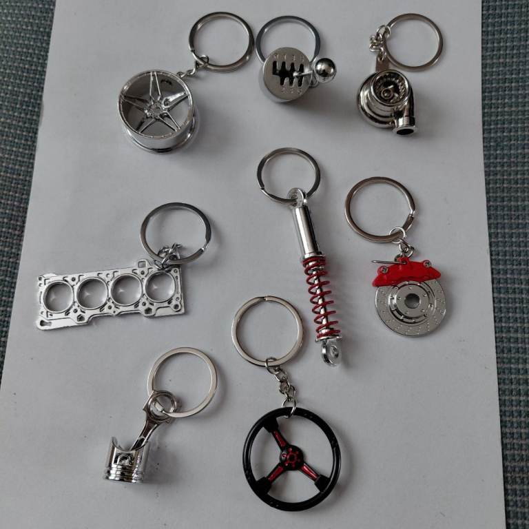 NOVELTY CAR PARTS KEYRINGS
