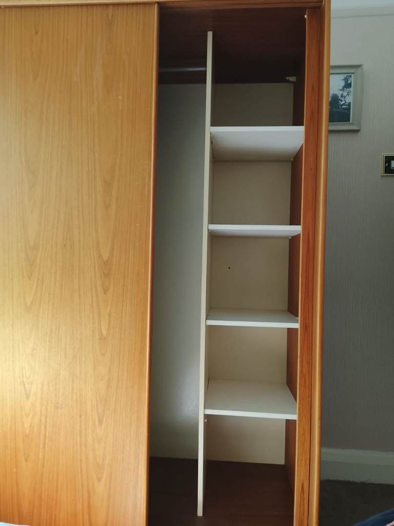 Wooden Wardrobe with Sliding Doors and Shelves – Good Condition