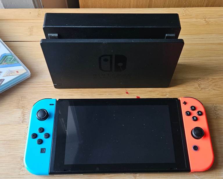 Nintendo Switch Console​ - games bundle (32GB + Neon Red/Blue Joy-Con)