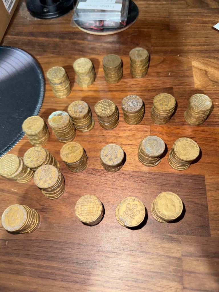 219 three pence coins 