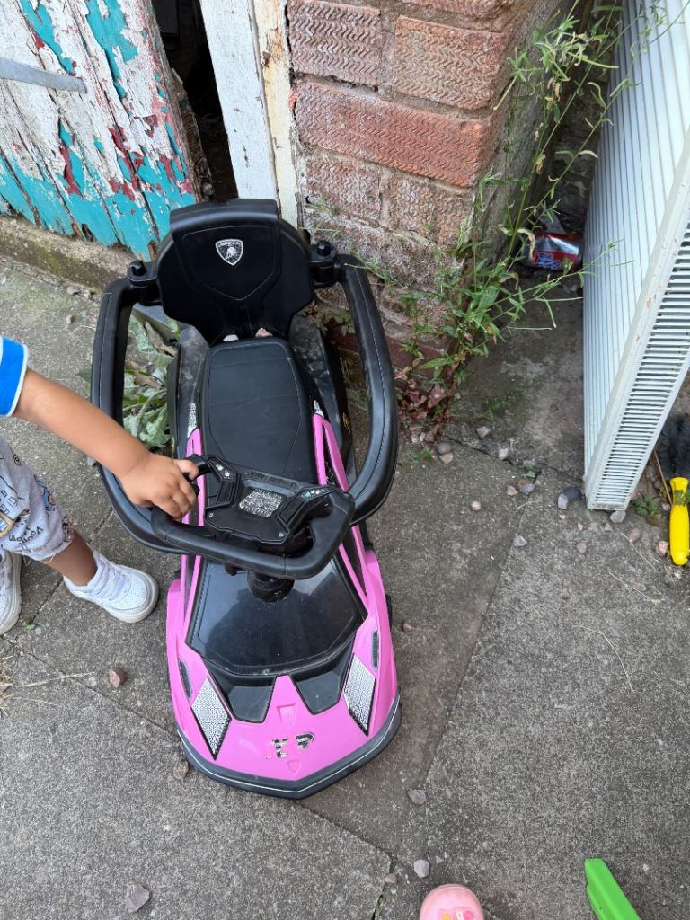 Pink Ride-On Toy Car for Kids – Good Condition