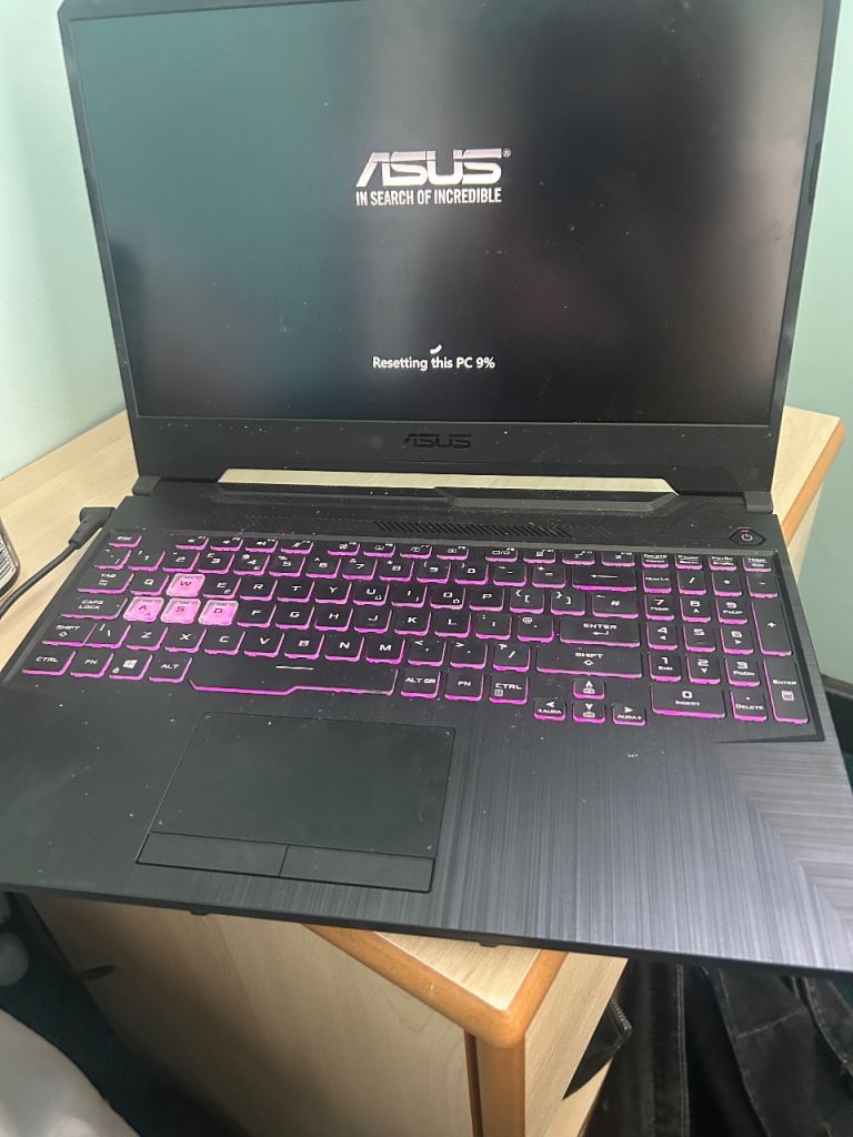ASUS laptop, with mouse and charger