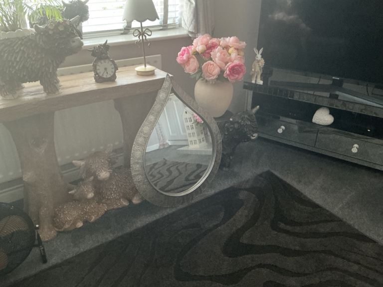 Lovely teardrop shape mirror