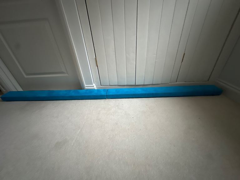 Blue gymnastics beam