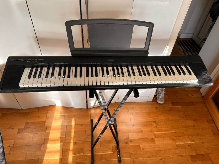 Yamaha NP-30 'Portable Grand' Piano, supplied with power supply and keyboard stand